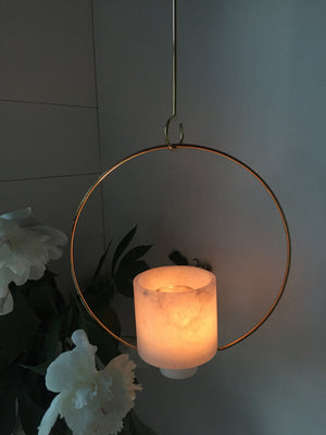 Image of M+A NYC Hanging Planter in alabaster being used as a lantern