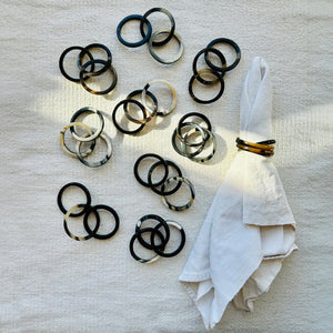 Photo of a selection of M+A NYC Horn Napkin Rings in the Dark Color Range