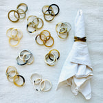 Photo of a selection of M+A NYC Horn Napkin Rings in the Light Color Range