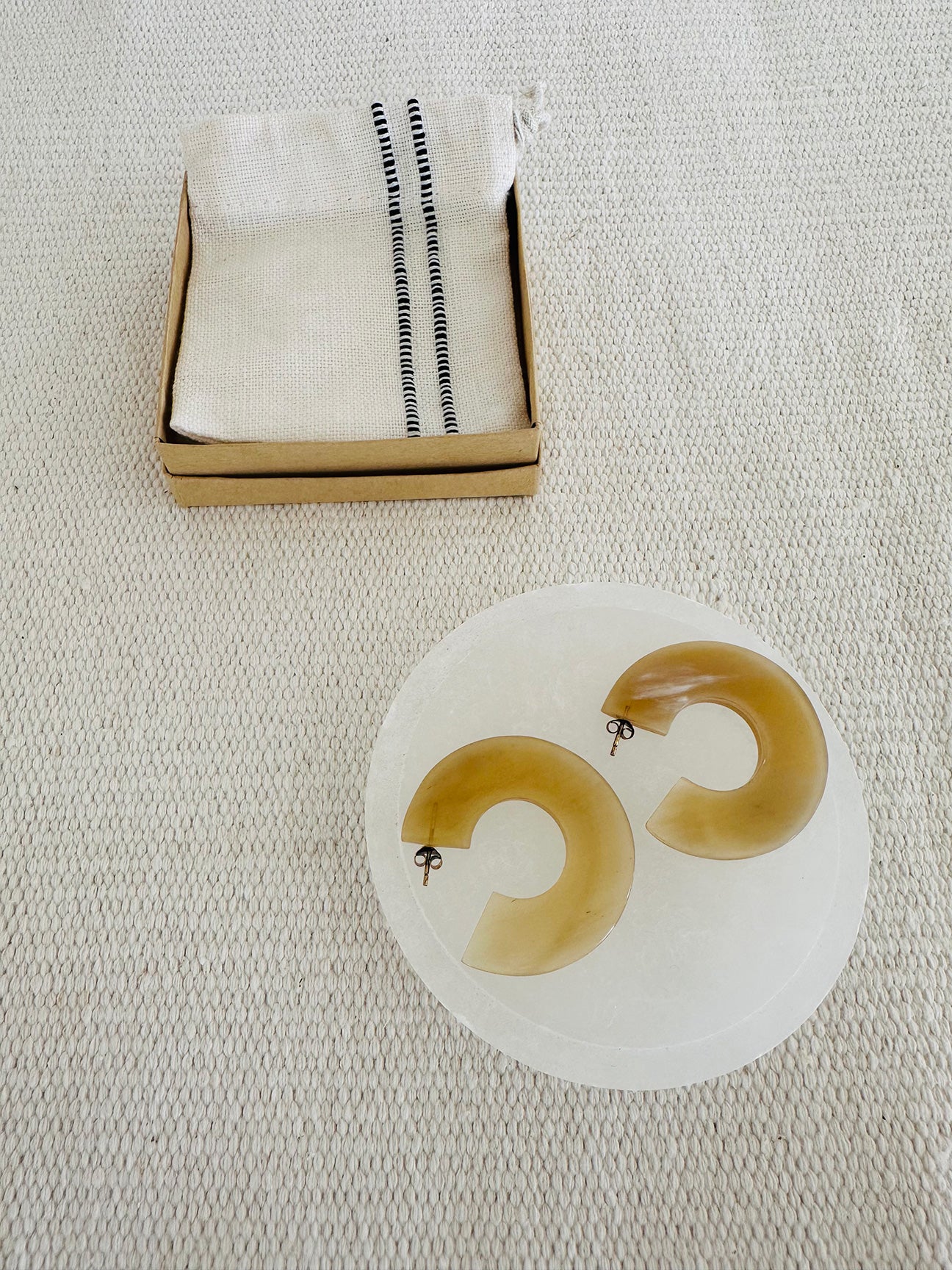 Photo of M+A Horn Hoop Earrings with gift box and handloomed cotton pouch