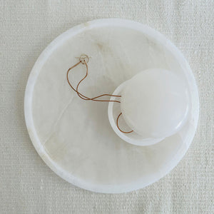 M+A NYC Alabaster Lens Box sitting on top of Alabaster Round Tray