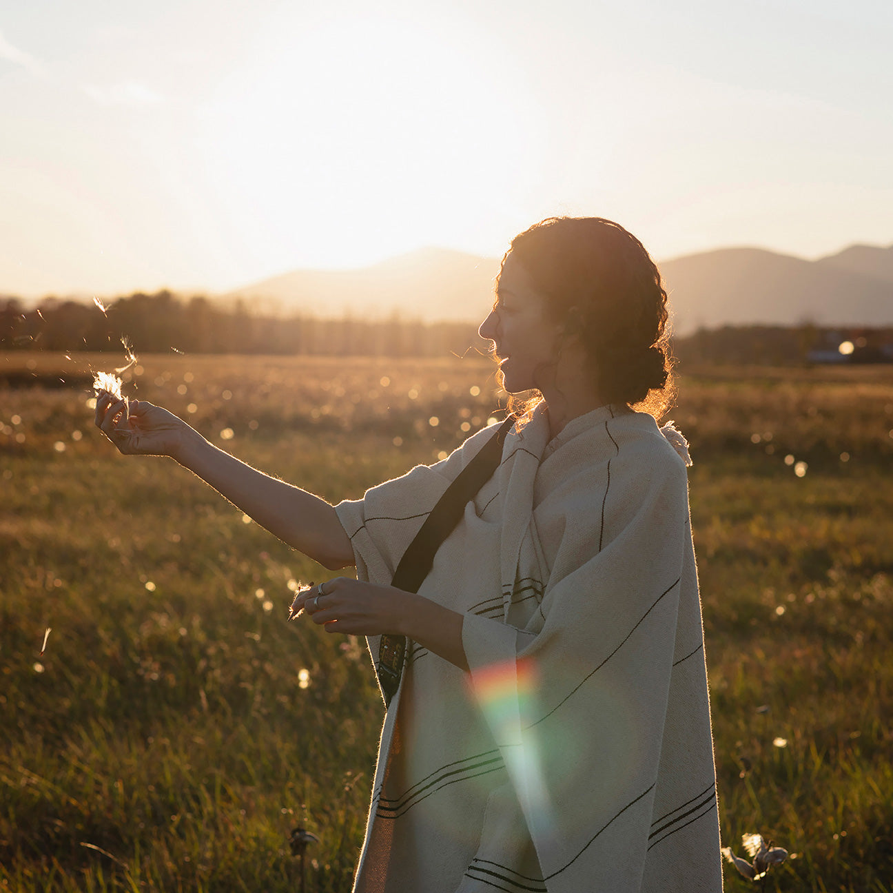 Photo of M+A NYC Handloomed Offset Stripe Cape worn by Kathi Hendrick. Photographer: Kate Warren