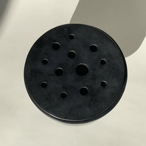 Image of the Ikebana Lid in black soapstone that is part of M+A NYC's Planter/Vase Set