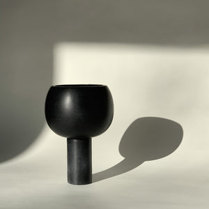 Image of M+A NYC Orb Planter in Medium Soapstone with a low luster black waxed finish.