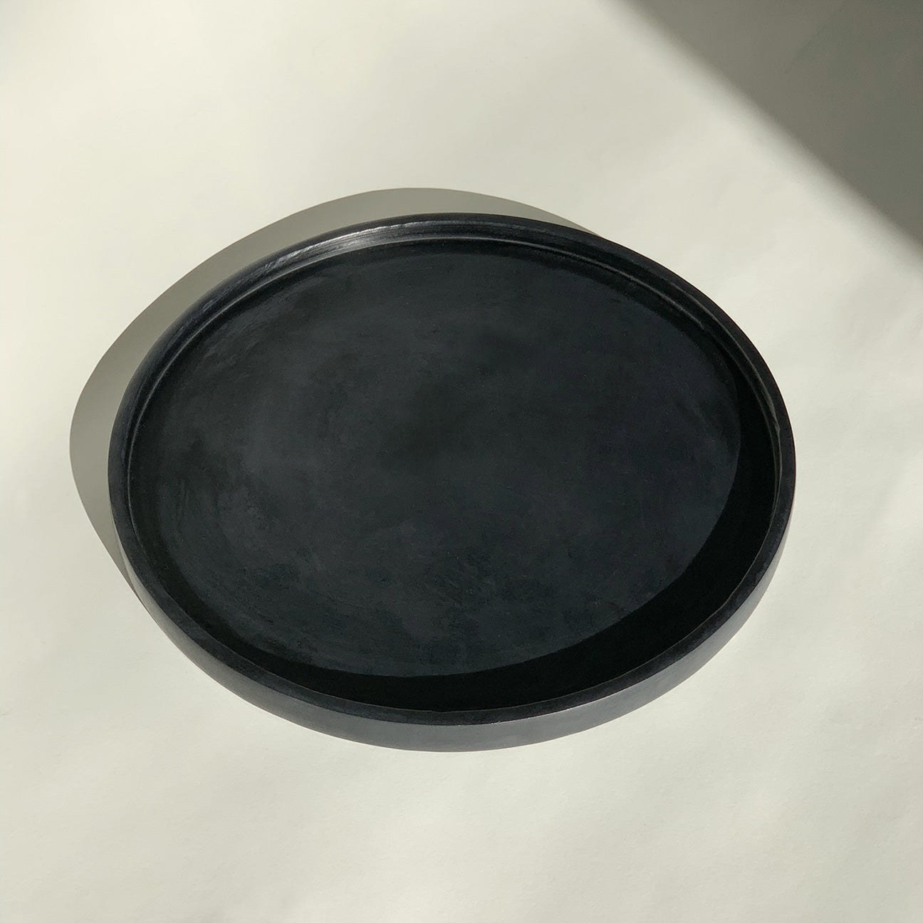 Image of M+A Soapstone Round Tray in black