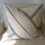 Image of M+A NYC Block Print Corner T Pixelated Stripes 18" Square Pillow on a cream leather chair.
