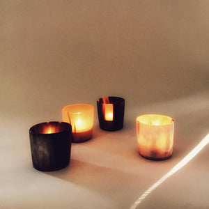 M+A NYC Horn Votive Holders - Grouping of them lit with a tea light candle